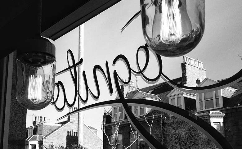 Cafe Cognito window on to St Swithin Street