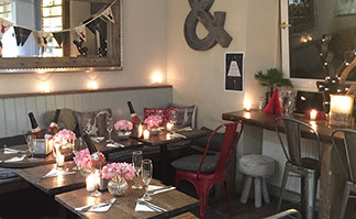 Inside Cafe Cognito, serving pink champagne